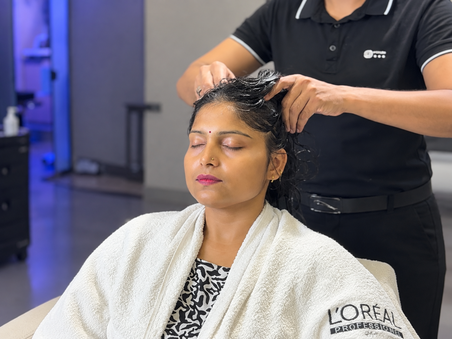Professional hair colour bar with mixing bowls, tint brushes and foils at Rush Salon, a hair salon in Surat