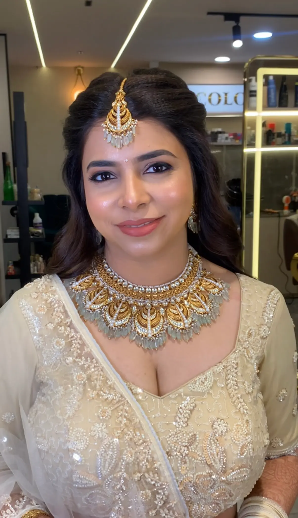 Glamorous evening reception makeup with defined eyes and bold lips at Rush Salon, Surat