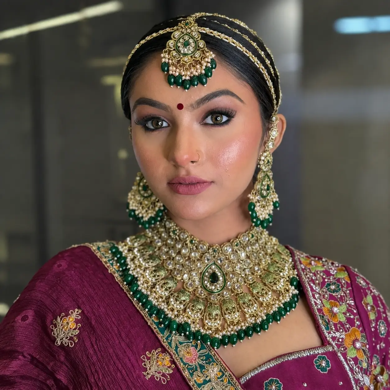 Rush Salon makeup artist with a client after a completed makeup look in Surat