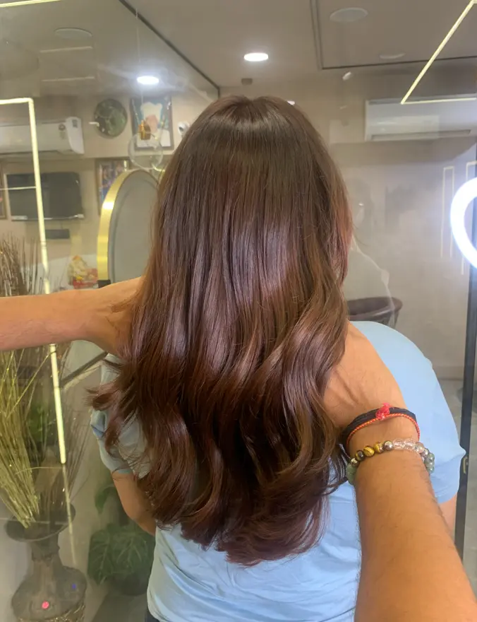 Mature client with natural grey coverage hair colour at Rush Salon, Surat
