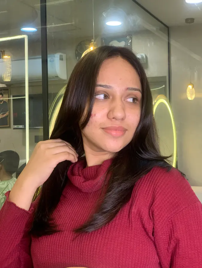 Sleek, smooth, glossy hair after a keratin smoothing treatment at Rush Salon, Surat