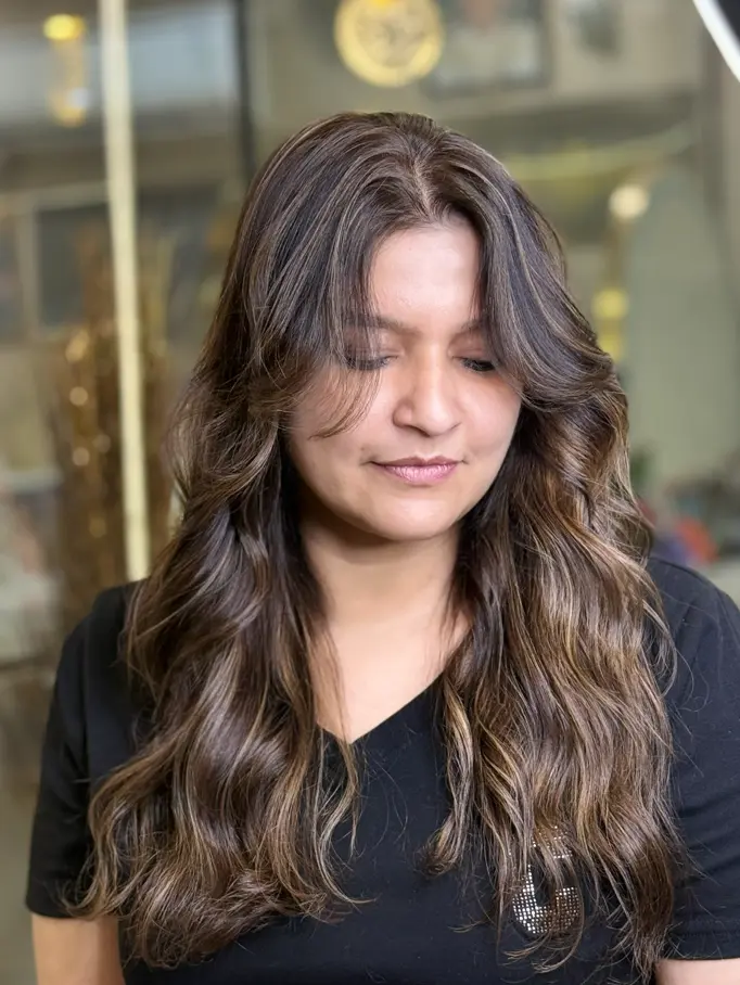 Wavy and curly hair textures seen from behind at Rush Salon, Surat