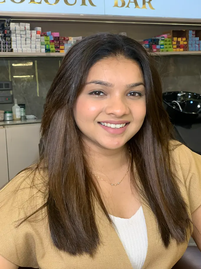 Client with an easy low-maintenance haircut at Rush Salon, Surat