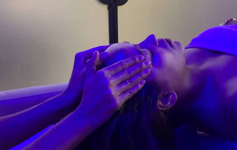 Client receiving a conditioning hair spa massage at the backwash basin of Rush Salon, Surat