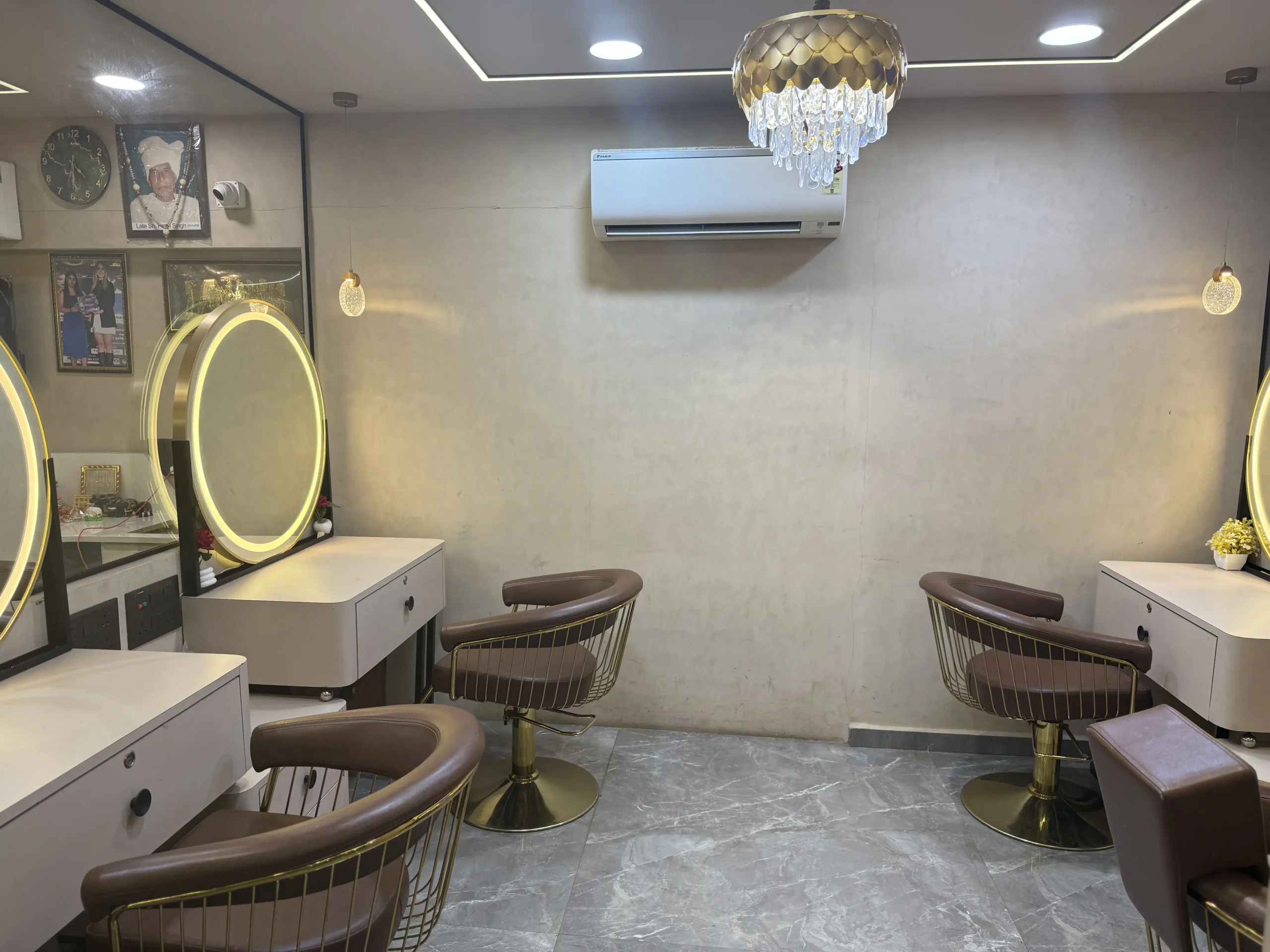 Styling chairs and mirrors in the hair room at Rush Salon, a hair salon in Surat