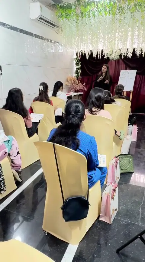 Makeup trainer at Rush Salon Surat guiding a student